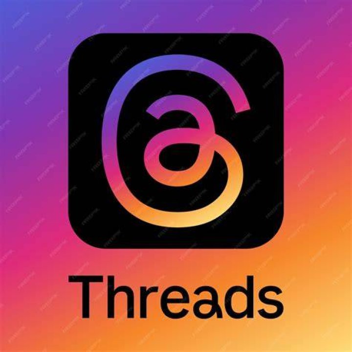 Threads logo over Instagram colors